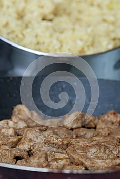 Cooking pork tenderlion and rice