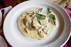 Pork tenderloin in mushroom sauce.