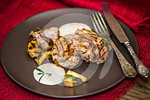 Pork tenderloin on mushrooms with dressing