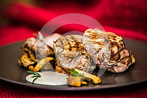 Pork tenderloin on mushrooms with dressing
