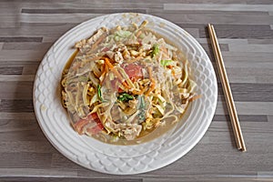 Pork and vegetables with noodles in Laos