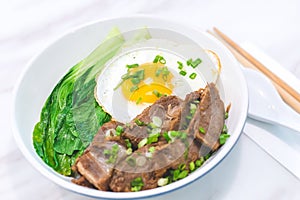 Porky Bowl Homemade char siu with rice and sunny side up & siew pak choy