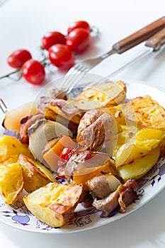 Porky skewer with potato wedges