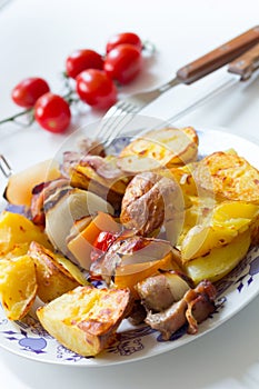 Porky skewer with potato wedges photo
