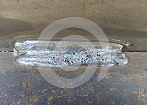 Porosity or worm hole in weld, Defect of welding process Flux Cored Arc Welding (FCAW photo