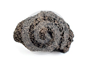 Porous black volcanic rock. Lava stone, pumice stone, or volcanic pumice with distinctive pores