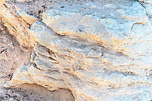 Porous Maltese stone as a structural background.