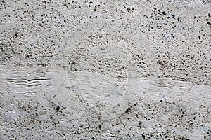 Porous plaster surface on a building