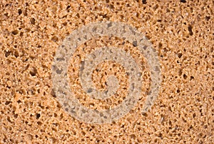 Porous texture of brown bread, cut coarsely