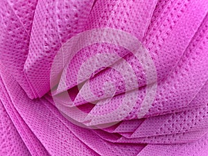 porous texture of non-woven purple fabric