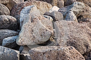 Porous volcanic boulders and basalt stones