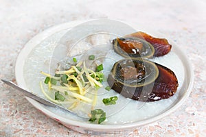 Porridge with century egg or preserved duck eggs.