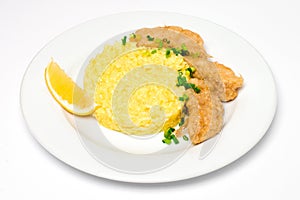 Porridge with chicken meat on a white background