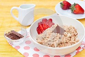 Porridge with fresh strawberry