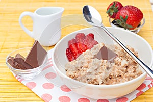 Porridge with fresh strawberry