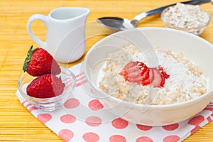 Porridge with fresh strawberry