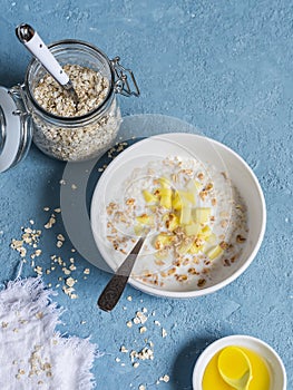 Porridge with fruit. Delicious healthy breakfast.