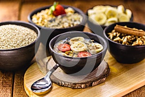 Porridge of oats and nuts, with quinoa and fruit