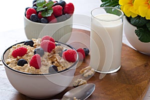 Porridge with raspberrys blueberrys and walnuts