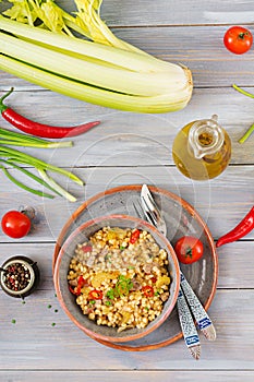 Porridge from Turkish couscous with beef and vegetables.