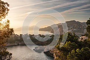 Port Andratx and villas of Cap de sa Mola at sunset, Mallorca, Baleares, Spain