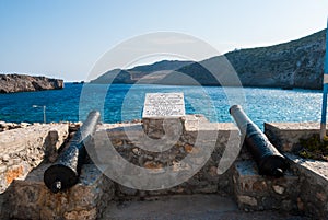 Port of Antikythera island with the canons in Greece. An island between Kythera and Crete.