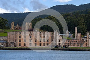 Port Arthur Australia, view across bay to penal colony with sightseeing tour in forecourt