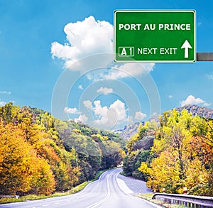 PORT AU PRINCE road sign against clear blue sky