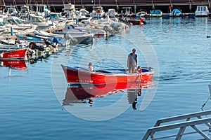 Port of boats and yachts with reflection in the water, San Sebastian, La Gomera,