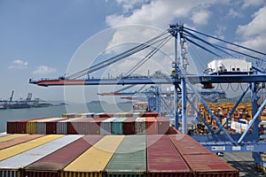 Port of Busan, South Korea. Container ships in the port under the gantry cranes. photo