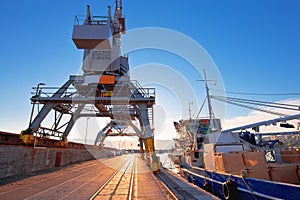 Port city of Rijeka cranes at breakwater view