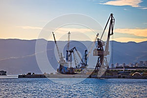 Port city of Rijeka cranes at harbor view