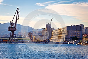 Port city of Rijeka cranes and industrial zone in harbor view