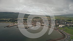 Port citycsape with modern, historic buildings at ocean bay aerial. Ships, yachts at pier city