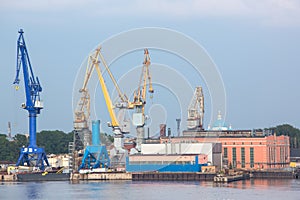 Port cranes with old warehose. Port of St.Petersburg