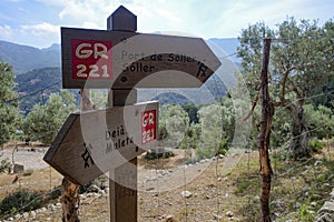 Port de Soller - 12 June, 2023: Signpost on the GR221 hiking trail in the Tramuntana mountains, Mallorca photo