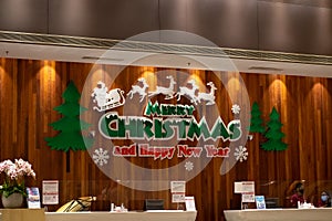 Merry Christmas and Happy New Year sign at the hotel and resort reception in Lexis photo