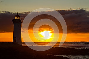 Port Fairy lighthouse, VIC glowing red sunrise