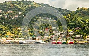 Port full of ships and houses on the hill, Kingstown, Saint Vincent and the Grenadines photo