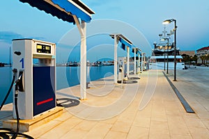 Port gas station in the morning ready to refill boat`s tanks