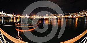Port of Genoa in night photo
