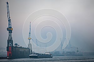 Port of Hamburg with big dock and cranes