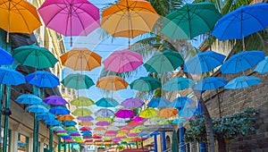 Port louis le caudan waterfront umbrellas capital of Mauritius