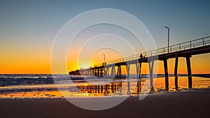 Port Noarlunga beach with jetty at sunset