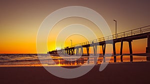 Port Noarlunga beach with jetty at sunset