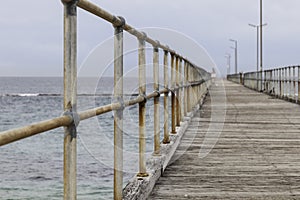 Port Noarlunga Jetty with cloud and sea.