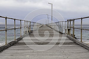 Port Noarlunga Jetty with cloud and sea. photo