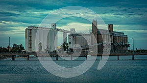 Port Pirie, SA, Australia - Industrial port silo buildings in the evening