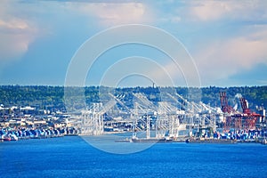 Port of Seattle with cranes and docks for ships