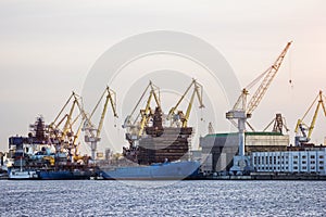 Port Ship Repair Loading crane dock shipping .logistic company concept